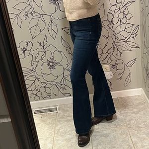 Michael Kors Flare jeans with square pocket detail. Size 8.